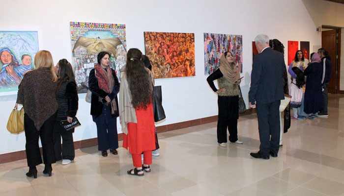 This image shows paintings displayed at the National Art Gallery in Islamabad on March 6, 2024. — Facebook/PNCA - Pakistan National Council of the Arts