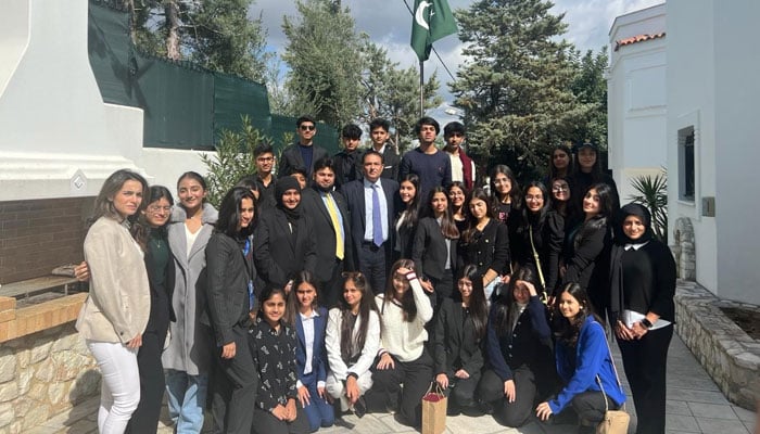 Ambassador Aamar Aftab Qureshi poses with students from the Bay View Academy Karachi in Greece on March 6, 2024. —  Facebook/Pakistan Embassy Greece