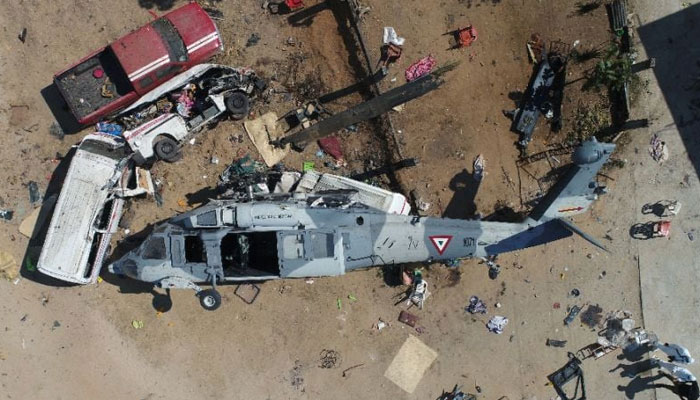 A crashed helicopter can be seen in Santiago Jamiltepec, Mexico. — AFP/File