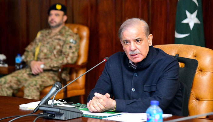 Prime Minister Shehbaz Sharif chairs a meeting regarding recent torrential rains and heavy snowfall and the ongoing rescue and relief activities for the affectees in Peshawar on March 6, 2024. — PID