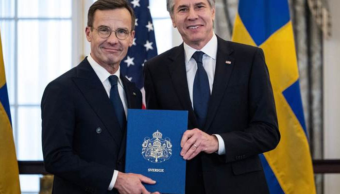 Swedish Prime Minister Ulf Kristersson handed over the final documentation to US Secretary of State Antony Blinken on March 7,2024. — AFP
