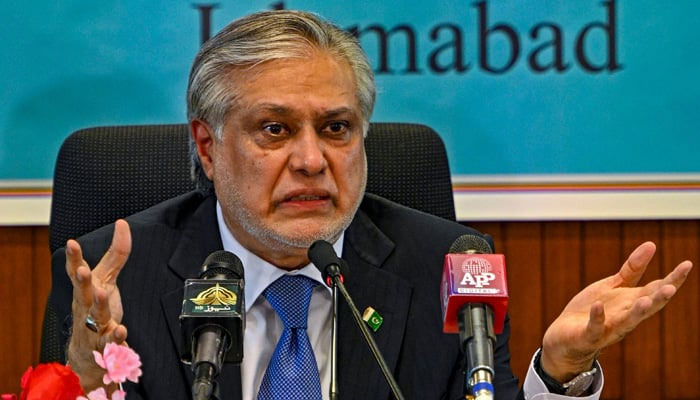Ishaq Dar, as finance minister, speaks while presenting the economic report for the fiscal year 2022-23, in Islamabad on June 8, 2023. — AFP