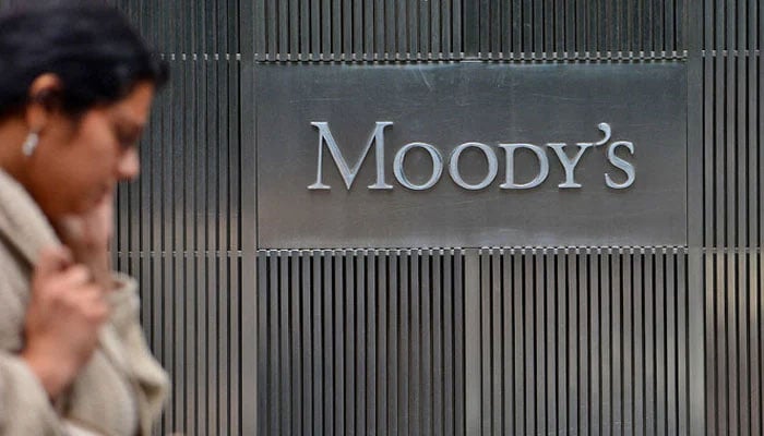 A sign for Moodys rating agency is displayed at the company headquarters in New York, US, on September 18, 2012. —AFP/File