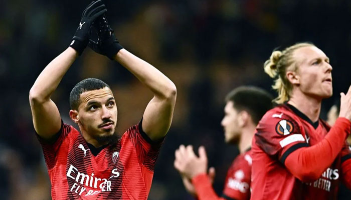 AC Milans Algerian midfielder Ismael Bennacer (left) celebrates the victory at the end of the UEFA Europa League match, Round of 16, against SK Slavia Prague at the San Siro Stadium in Milan on March 7, 2024. — AFP