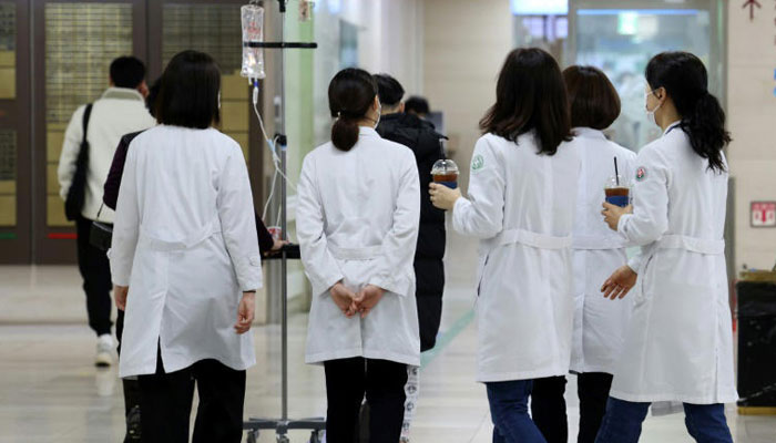 A group of South Korean Female doctors stand in a hospital. — AFP/File