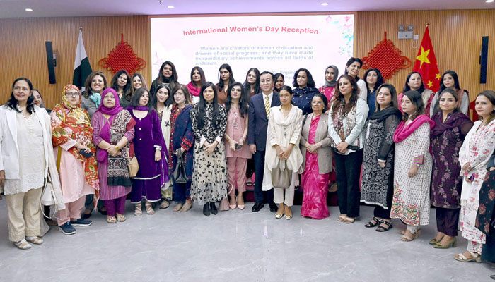Consul General of the Peoples Republic of China in Karachi Mr. Yang Yundong in a group photo during International Women’s Day celebration ceremony at Consulate General of China in Karachi on March 6, 2024. —  APP