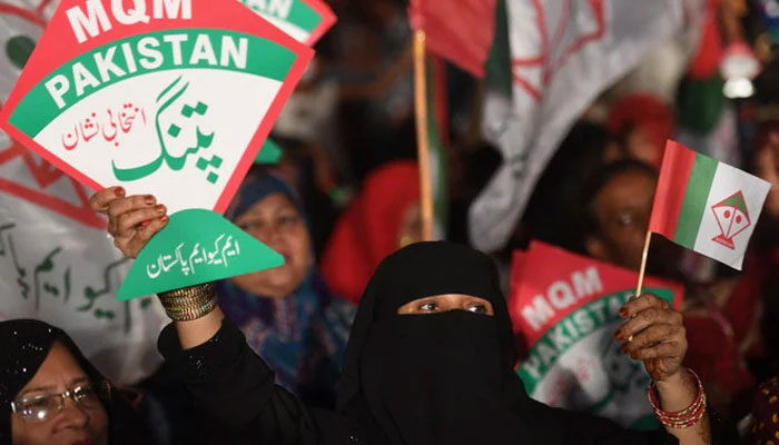 Supporters of the Muttahida Qaumi Movement (MQM-Pakistan) attend a campaign meeting in Karachi. — AFP/File