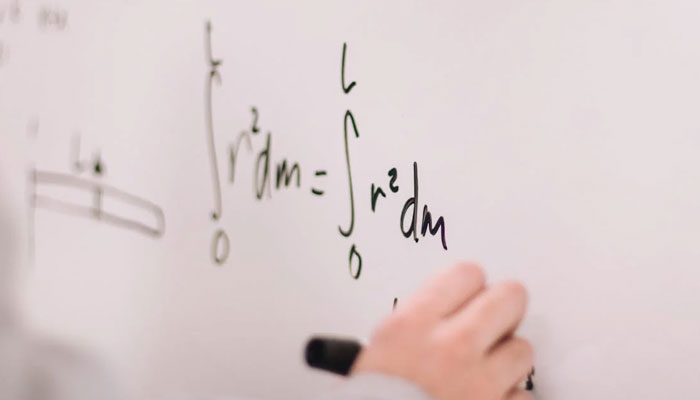In this representational image, a person solving a maths problem. — Pexels