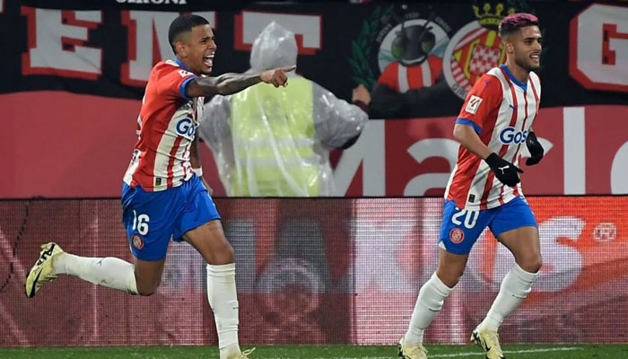 Savinho celebrates after scoring Girona’s second goal in the La Liga match against Osasuna on March 9, 2024. — AFP