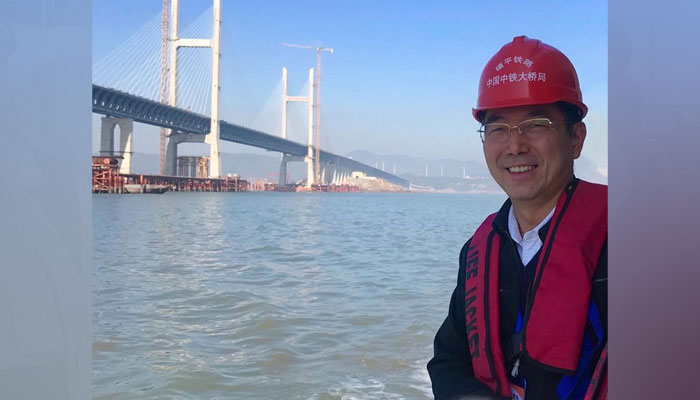 Gao Zongyu, Deputy to National Peoples Congress (NPC) from Hubei province of China gestures in this image. — APP/File