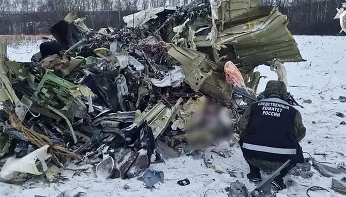 This grab taken from handout footage released by the Russian Investigative Committee on January 25, 2024, shows Russian IL-76 military transport plane crash site in the Belgorod region. — AFP