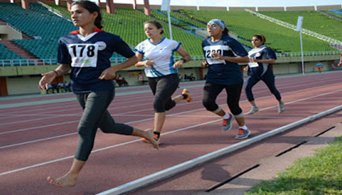 Female athletes running on a field track. — Athletics Federation of Pakistan/website/File