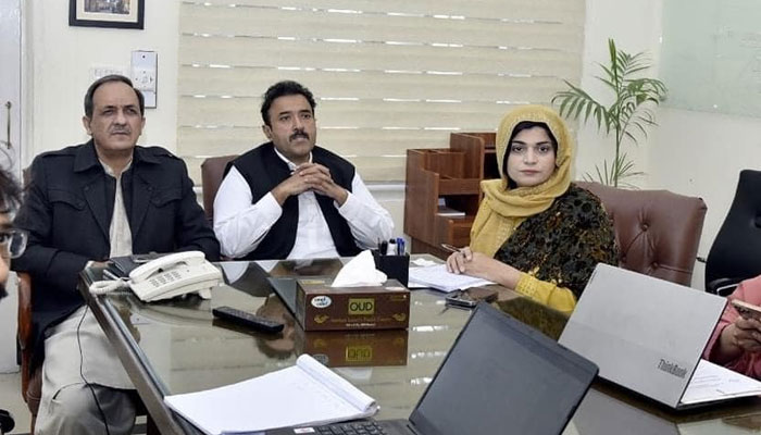 Minister for Local Government and Community Development (LG & CD) Zeeshan Rafique (C) gestures during a meeting on March 13, 2024. — Facebook/Mian Zeeshan Rafique PMLN