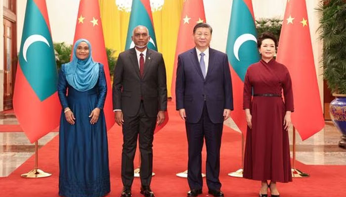 Maldives President Mohamed Muizzu (second from left), his wife Sajidha Mohamed (left), Chinese President Xi Jinping (second from right) and his wife Peng Liyuan pose for photo during a welcome ceremony at the Great Hall of the People in Beijing. — AFP/File