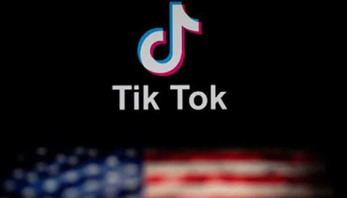 This representational image shows the TikTok logo with the shadow of the US flag.. — AFP/File