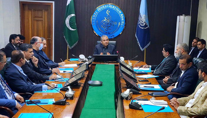 Federal Minister for Interior, Mohsin Naqvi chairs a meeting at FIA headquarters on March 13, 2024. — APP