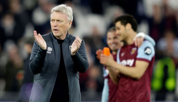 West Ham Uniteds Scottish manager David Moyes applauds the fans following the UEFA Europa League round of 16 second leg football match between West Ham United and SC Freiburg at The London Stadium, in east London on March 14, 2024. West Ham won the match 5-0. —AFP/File