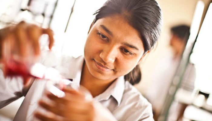 A representational image showing a female student in a lab. — British Council website/File