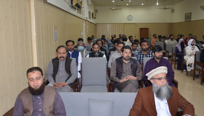 People sit during the inaugural ceremony of the annual Dars-e-Quran’ series on March 15, 2024. — Facebook/Punjab University Library