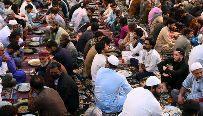 Faithful Muslims are breaking the fast (Iftar) during the Holy month of Ramadan-ul-Mubarak. — PPI File