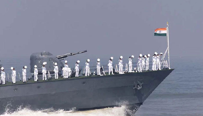 Indian Navy personnel gesture on an Indian Navy ship at an undisclosed location. — AFP/File