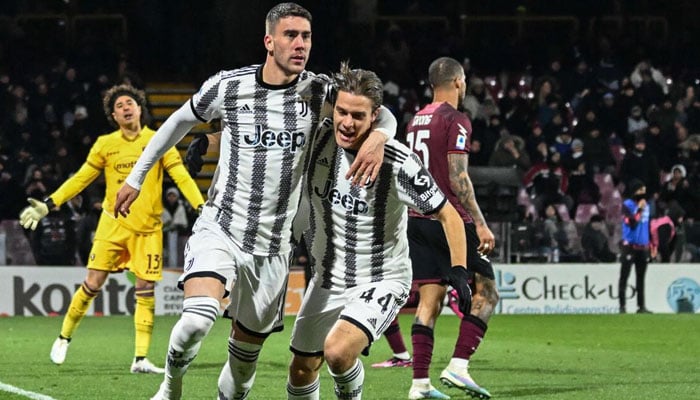 Dusan Vlahovic (L) celebrates with Nicolo Fagioli after scoring his second goal during the Serie A match against Salernitana on February 7, 2023. — AFP