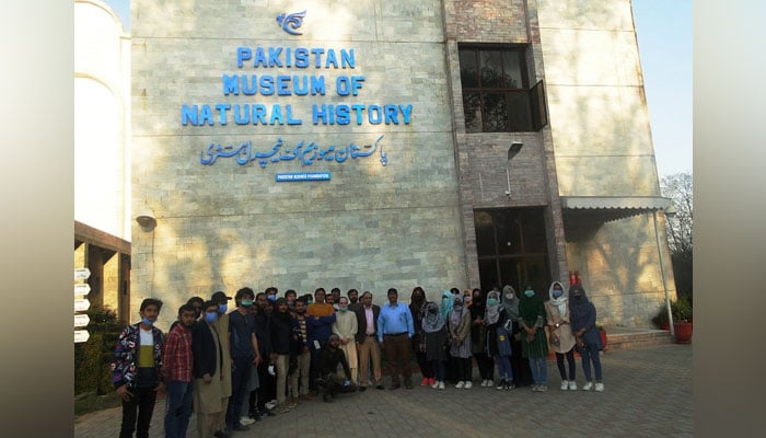 People pose for a photo outside the Pakistan Museum for Natural History (PMNH). — Facebook/Pakistan Museum of Natural History (PMNH)/File