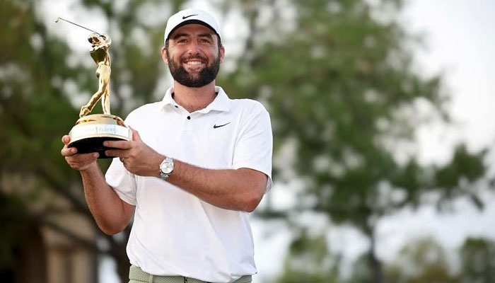 Scottie Scheffler of the United States posing with the trophy after winning The Players Championship at TPC Sawgrass. — AFP/File