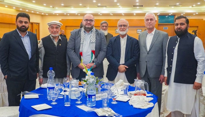 Participants pose for a photo at an Iftar dinner for foreign diplomats and bureaucrats to apprise them of the welfare activities of the foundation organised by The Al-Khidmat Foundation Pakistan (AKFP) on March 18, 2024. — Facebook/Alkhidmat Foundation Pakistan