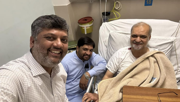 Karachi Jamat-e-Islami chief Hafiz Naeem-ur-Rehman gestures for a selfie in the Hospital, this image was released on March 18, 2024. — Facebook/Hafiz Naeem ur Rehman