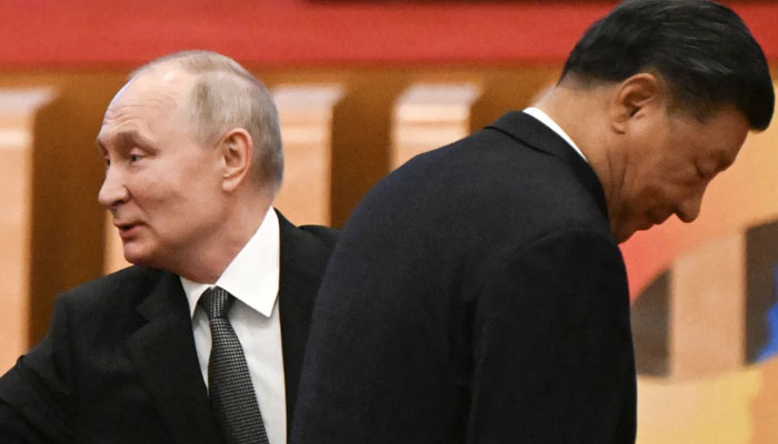 Chinese leader Xi Jinping and Russias President Vladimir Putin attend an event at Beijings Great Hall of the People. — AFP/File