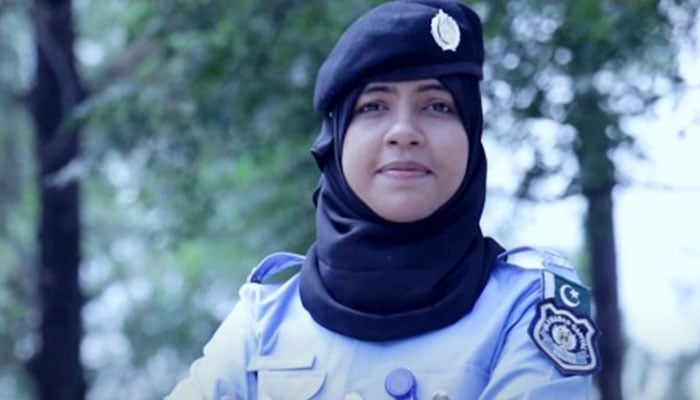 A female police officer can be seen in this still taken from the video of  the anthem Jannat Say Bulaawa Aaya Hai released by the Islamabad Police on March 19, 2024. — YouTube/Islamabad Police