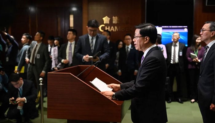 Chief Executive John Lee speaks to the media in the Legislative Council building after the passing of the Article 23 National Security Law in Hong Kong. — AFP/File