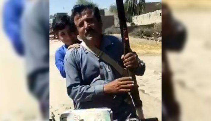 Slain teacher Allah Rakhiyo Nandwani seen in this still taken from a video. — X/Iqbalanzar/File