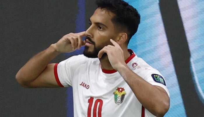 Jordanian footballer Musa Al-Taamari celebrates after scoring against South Korea. — AFP/File