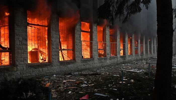 This photograph taken on March 20, 2024, shows the burning industrial facility following a Russian missile attack in Kharkiv. — AFP/File