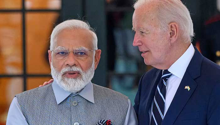 US President Joe Biden (R) greets Indias Prime Minister Narendra Modi as he arrives at the South Portico of the White House in Washington, DC on June 21, 2023. — AFP