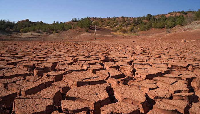 The dried cracked land area can be seen in this image. — AFP/File