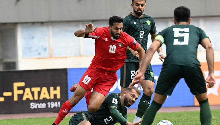 Jordan’s Mousa Al Tamari (L) and Pakistan’s Alamgir Ali Khan ((2L) fight for the ball during the 2026 FIFA World Cup qualifier football match between Pakistan and Jordan at the Jinnah Sports stadium in Islamabad on March 21, 2024. — AFP