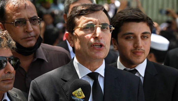 PTI Chairman Barrister Gohar Khan speaks with the media outside the High Court in Islamabad on August 29, 2023. — AFP