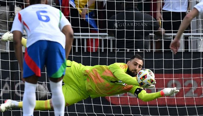 Gianluigi Donnarumma stopping the ball in Italy vs Venezuela game on March 22, 2024.—X@FootballItalia