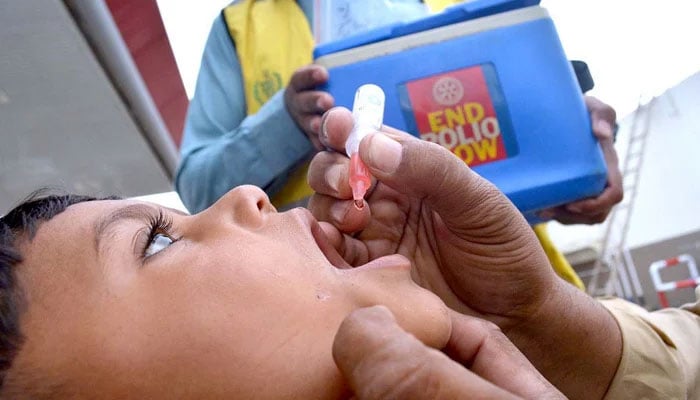 A health worker is administering Polio drops to children during a country-wide vaccination campaign. — APP/File