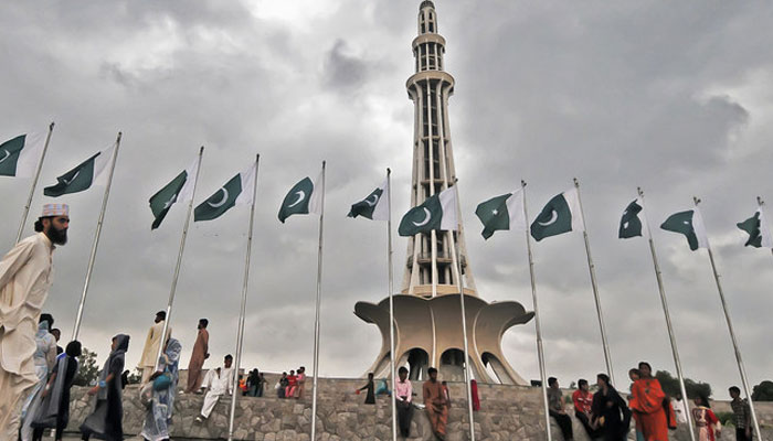 Pakistanis gather in front of the Minar-e-Pakistan in Lahore. — AFP/File