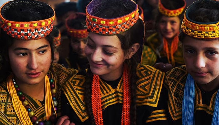 Kalash students attend a class at a school in the Brun village of Bumboret valley. — AFP/File