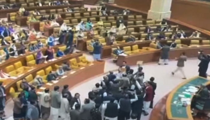 PTI-backed SIC lawmakers gather before the speakers dice inside the Punjab Assembly, in this still taken from a video. — YouTube/Geo News Live/File