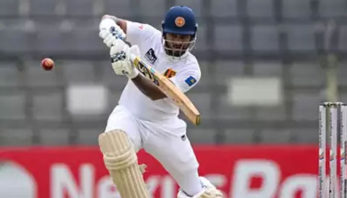 Sri Lankan cricketer Dimuth Karunaratne plays a shot during a Test match. — AFP/File
