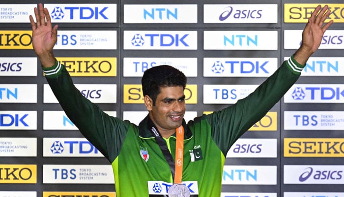 Silver medalist, Pakistans Arshad Nadeem celebrates during the podium ceremony for the mens javelin throw during the World Athletics Championships in Budapest on August 27, 2023. — AFP