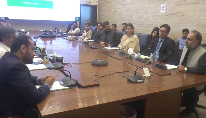 In this still, Minister Primary and Secondary Healthcare Punjab Khawaja Imran Nazeer (L) and Khyber Pakhtunkhwa Health Minister Syed Qasim Ali Shah (R) discuss health issues on March 23, 2024. — Facebook/Primary & Secondary Healthcare Department