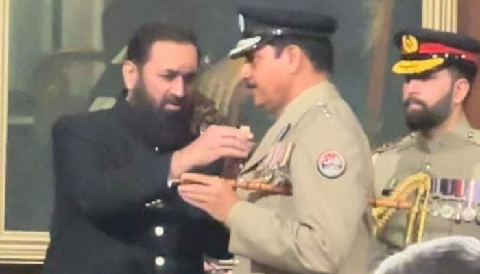 Governor of Punjab Muhammad Balighur Rehman bestowed the award upon the Senior Superintendent of AJK police at a special Pakistan National Awards distribution ceremony at the Governor House in Lahore on March 23, 2024. — Screengrab/Facebook/AJK Police