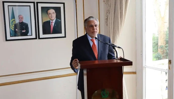 Foreign Minister Ishaq Dar interacting with officers of Pakistan High Commission in London on March 20, 2024. — X/PakistaninUK
